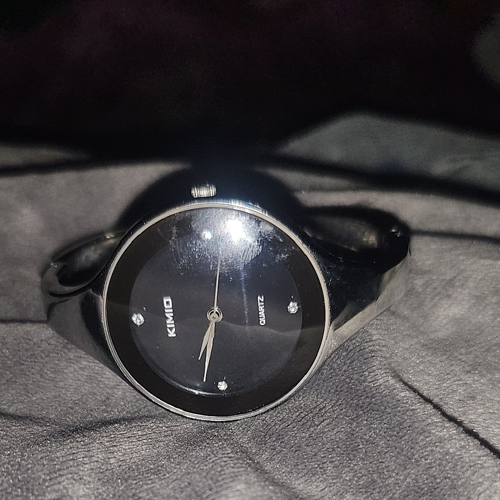 Black and Silver Analog Watch with Minimalist Design